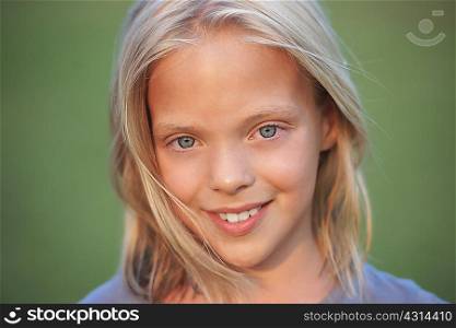 Close up portrait of girl with blond hair