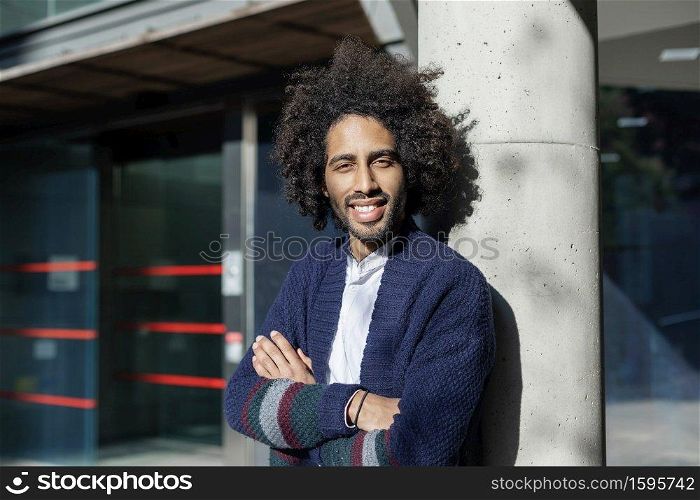 Close up portrait of handsome young african american man smiling