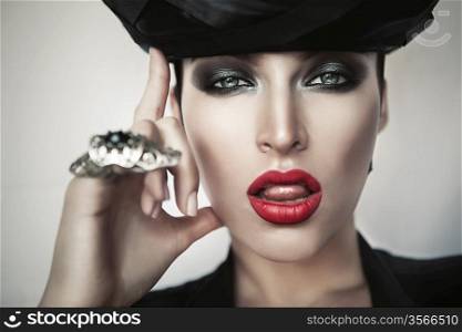 close-up portrait of hot woman in black hat