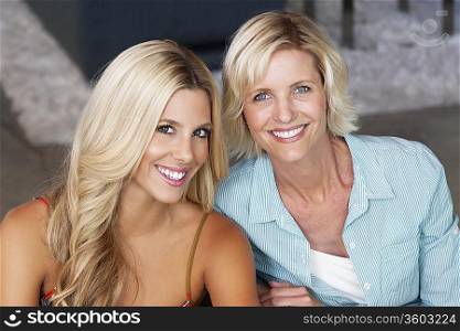 Close-up portrait of mother and daughter