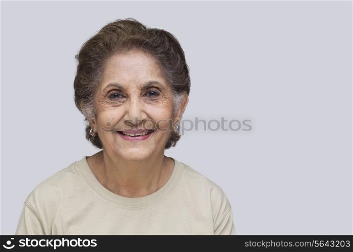 Close-up portrait of old woman smiling