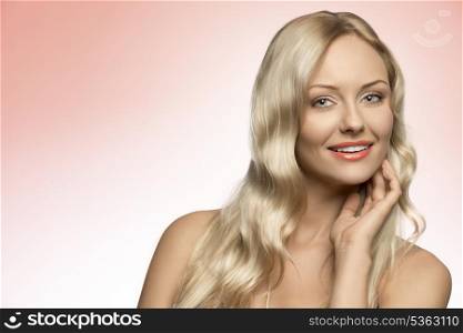 close-up portrait of pretty blonde woman with perfect skin and beautiful long hair
