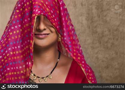Close-up portrait of rural woman wearing sari