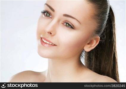 Close up portrait of sensual beautiful young woman fashion, purity complexion. Perfect clean skin. Studio shot