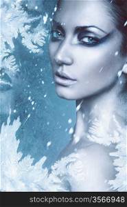 close up portrait of sexy winter woman in snow