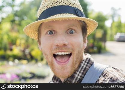 Close-up portrait of surprised gardener