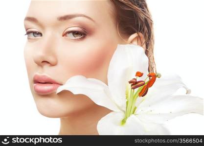 close-up portrait of wet woman with white flower on white background