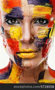 close up portrait of woman in colourful paint