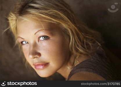 Close-up portrait of young Caucasian blond woman.