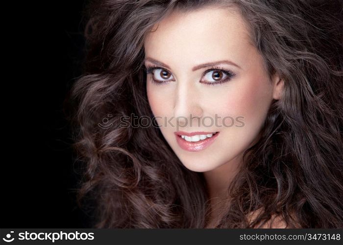 close-up portrait of young smiling brunette, shallow DOF, clear focus on model&acute;s eye