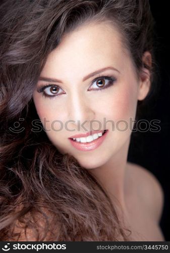 close-up portrait of young smiling brunnete, shallow DOF, clear focus on model&acute;s eye