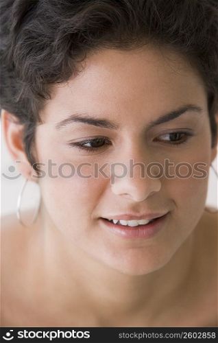 Close up portrait of young woman smiling