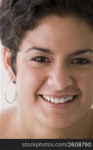 Close up portrait of young woman smiling