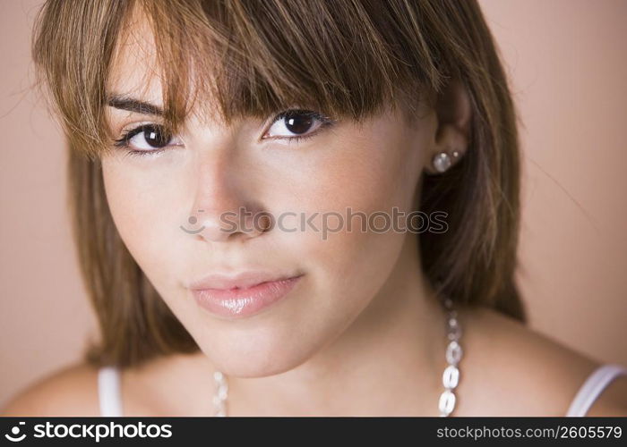 Close up portrait of young woman, studio