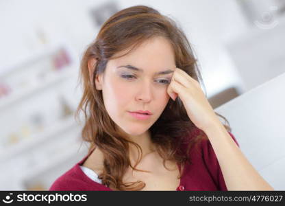 close up portrait of young woman with headache