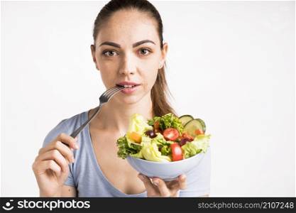 close up portrait woman holding salad