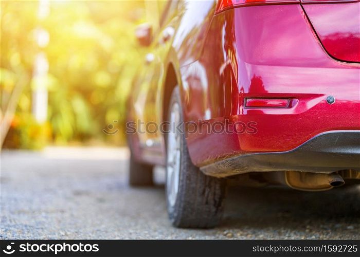 Close-up rear car get scratched of Red auto or automobile motor car of shiny convertible luxury outside background,transportation trip concept