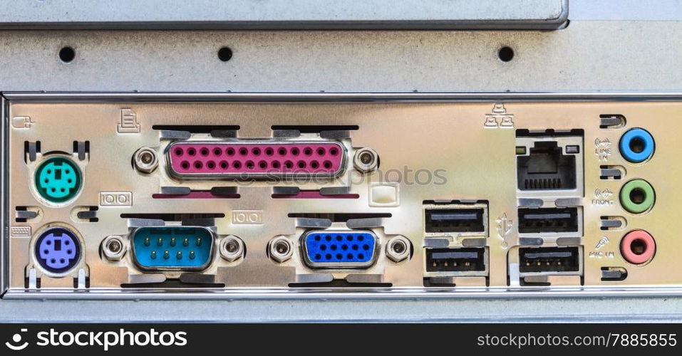 Close up rear panel of computer with audio, usb, ethernet and other connectors