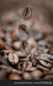 Close up - roasted coffee beans as a background composition, can be used as a background.