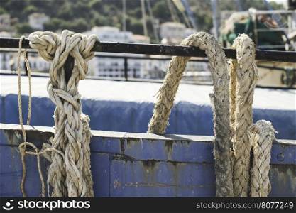 Close up ropes. Loosened boat ropes