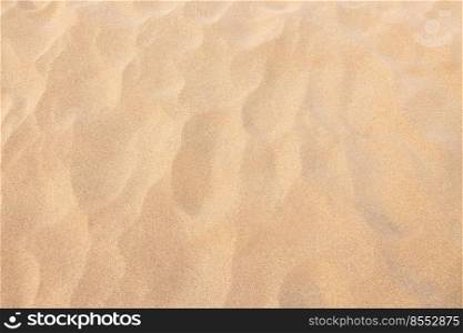 close up sand texture pattern background of a beach in the summer