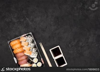 close up sashimi sushi plate with soya sauce black surface. Resolution and high quality beautiful photo. close up sashimi sushi plate with soya sauce black surface. High quality beautiful photo concept