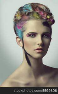 close-up shoot of beauty female with artistic make-up and hair-style, colorful painted hair and sensual eyes