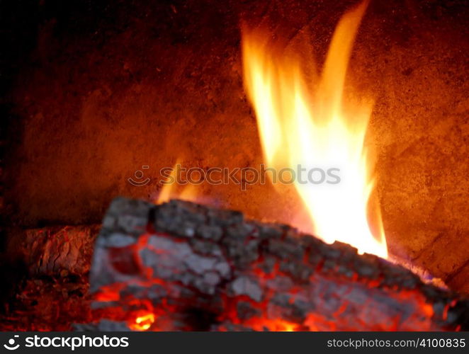 Close up shoot of real fire in the fireplace