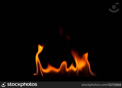 Close-up shot of a black background flame
