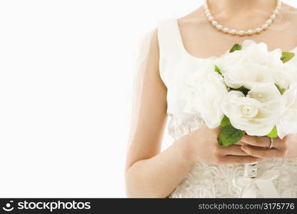 Close up shot of an Asian bride holding bouquet.