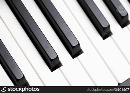 Close up shot of black & white piano keys