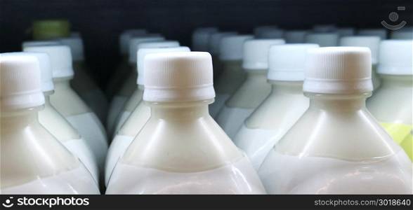 Close up shot of bottles with milk product