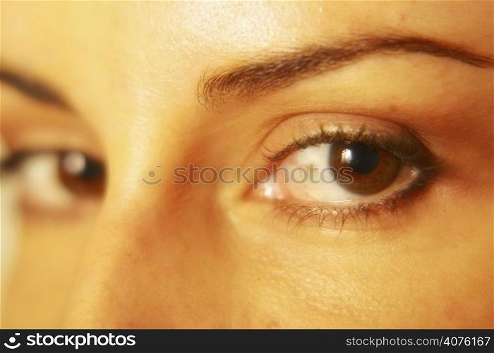Close up shot of brown eyes.