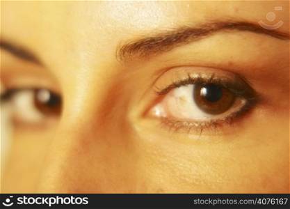 Close up shot of brown eyes.