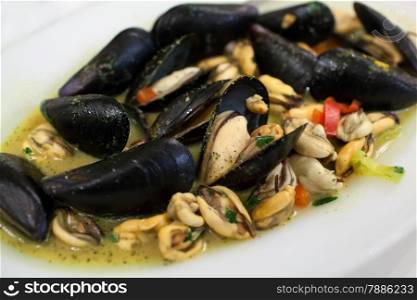 Close-up shot of delicious dish with mussels. Seafood and mediterranean cuisine