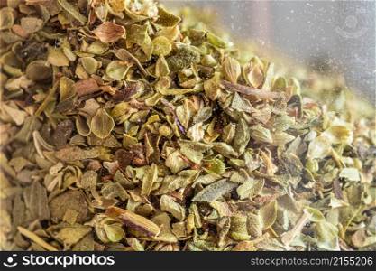 Close-up shot of dried thyme in a glass jar