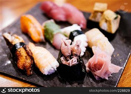 Close up shot of fresh mix Sushi plate, Japanese various Sushi