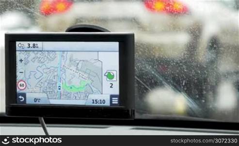 Close-up shot of Global Positioning System device in moving car. Useful thing in any travel