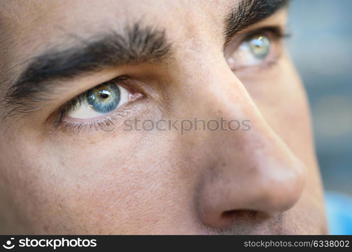 Close-up shot of man&rsquo;s eye. Man with blue eyes.