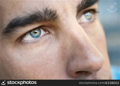 Close-up shot of man&rsquo;s eye. Man with blue eyes.