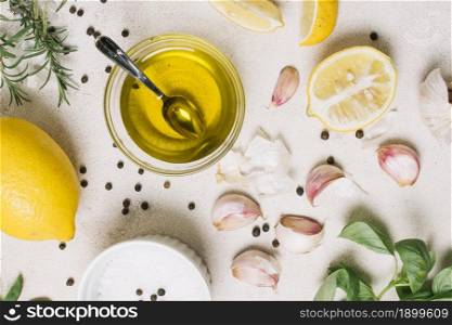 close up shot top view olive oil surrounded by cooking ingredients. Resolution and high quality beautiful photo. close up shot top view olive oil surrounded by cooking ingredients. High quality beautiful photo concept