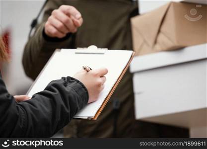 close up signing package delivery. Resolution and high quality beautiful photo. close up signing package delivery. High quality beautiful photo concept