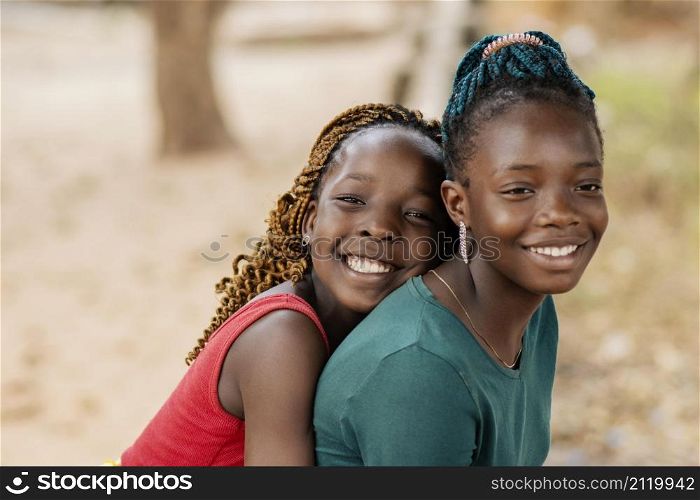 close up smiley african girls outdoors