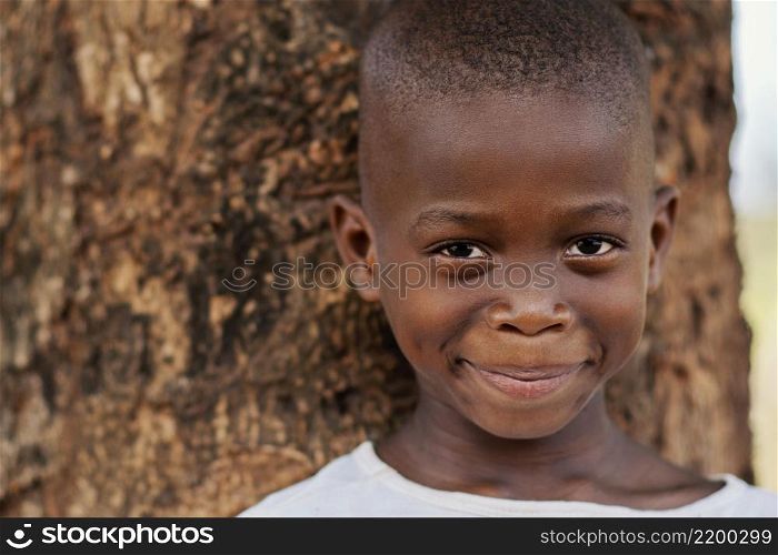 close up smiley african kid outdoors