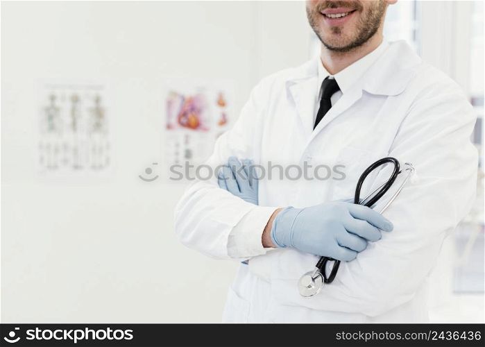 close up smiley doctor with stethoscope 3