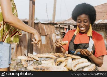 close up smiley woman making food