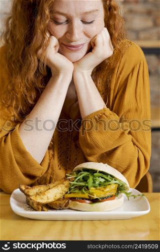 close up smiley woman with food