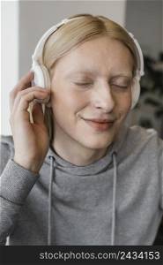 close up smiley woman with headphones
