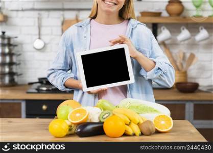 close up smiley woman with tablet mock up