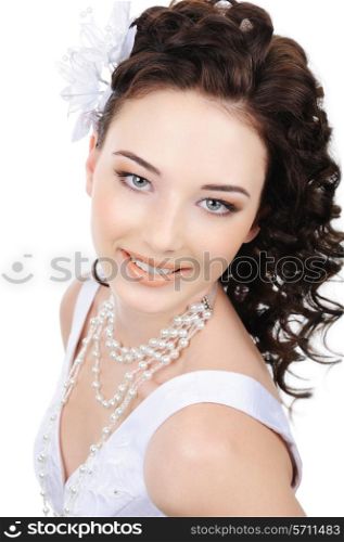 Close-up smiling face of young beauty bride